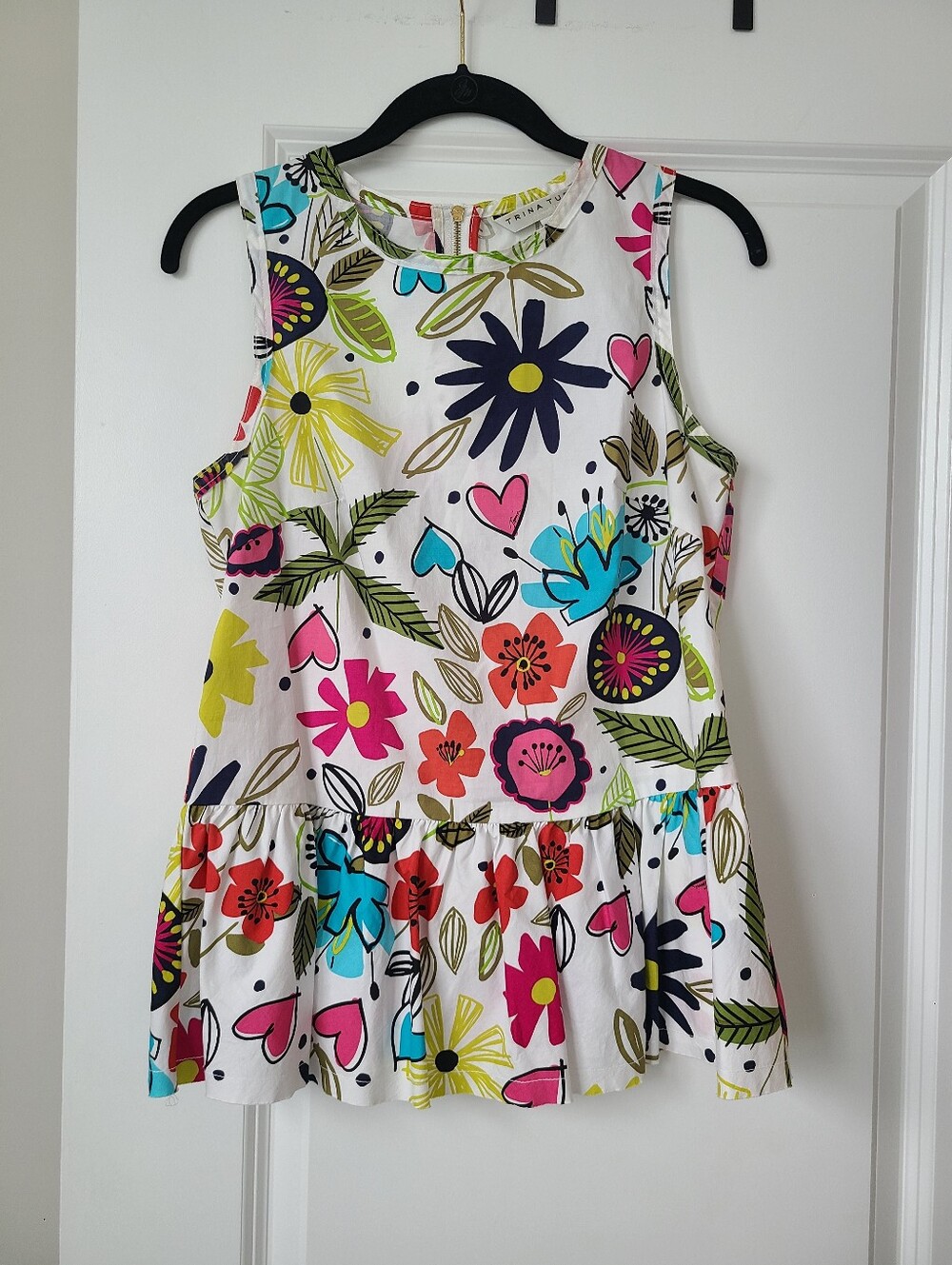 Trina Turk Albano Peplum Top In A Colorful Floral Print